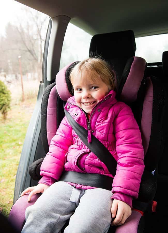 Girl in carseat, Safe driver discount and savings