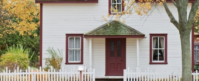 A house with a white picket fence