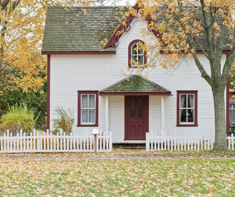A house with a white picket fence