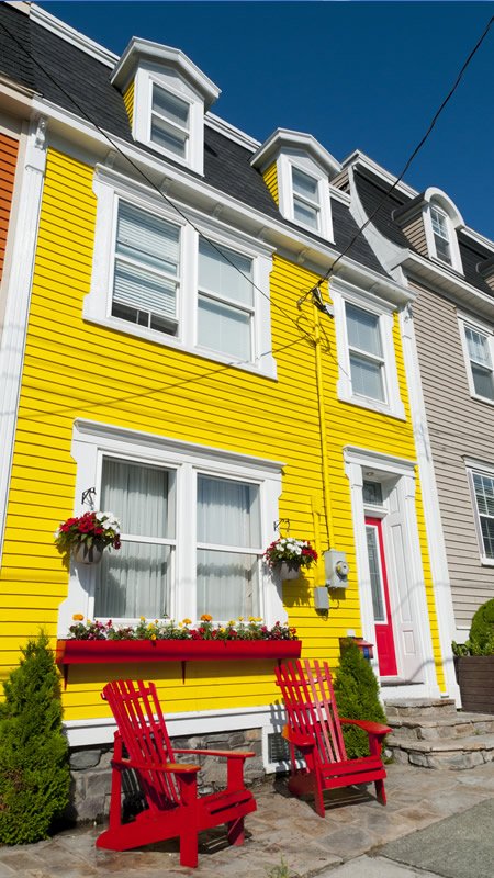 A yellow townhouse in downtown, St. John's.
