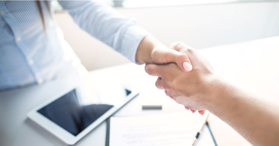 Two people shaking hands